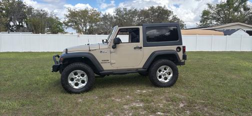 Beige 2016 Jeep Wrangler Sport