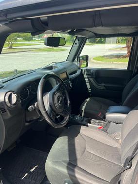 Gray 2016 Jeep Wrangler Unlimited Sport