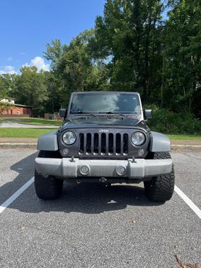 Gray 2016 Jeep Wrangler Unlimited Sport