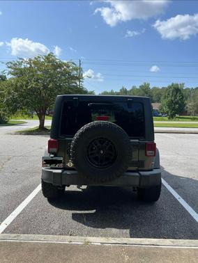 Gray 2016 Jeep Wrangler Unlimited Sport
