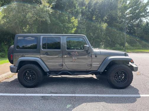 Gray 2016 Jeep Wrangler Unlimited Sport