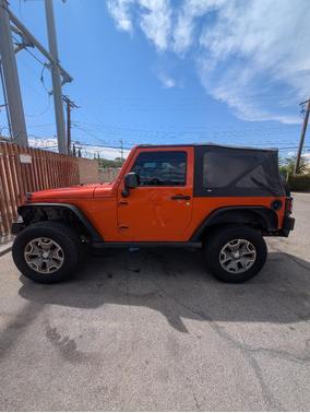 Orange 2010 Jeep Wrangler Rubicon