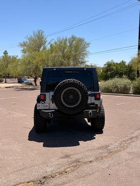 Silver 2016 Jeep Wrangler Unlimited Sport