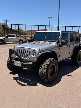 Silver 2016 Jeep Wrangler Unlimited Sport