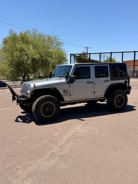 Silver 2016 Jeep Wrangler Unlimited Sport