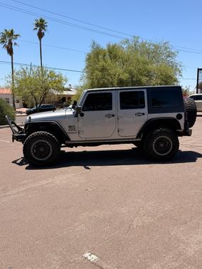 Silver 2016 Jeep Wrangler Unlimited Sport