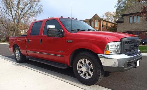 Red 2000 Ford F-250 Lariat Crew Cab Super Duty