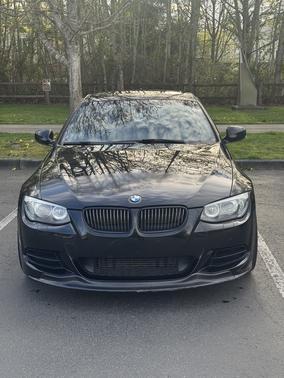 Black 2012 BMW 335 is