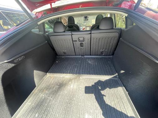 Red 2025 Tesla Model Y Long Range RWD