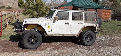 White 2012 Jeep Wrangler Unlimited Sport
