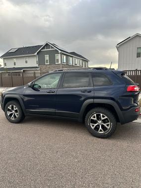 Blue 2016 Jeep Cherokee Trailhawk
