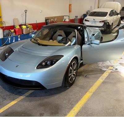 Blue 2010 Tesla Roadster Base