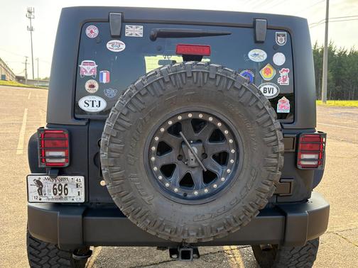 Black 2014 Jeep Wrangler Unlimited Sport