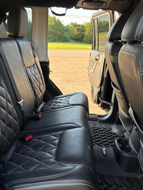 Black 2014 Jeep Wrangler Unlimited Sport