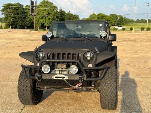 Black 2014 Jeep Wrangler Unlimited Sport