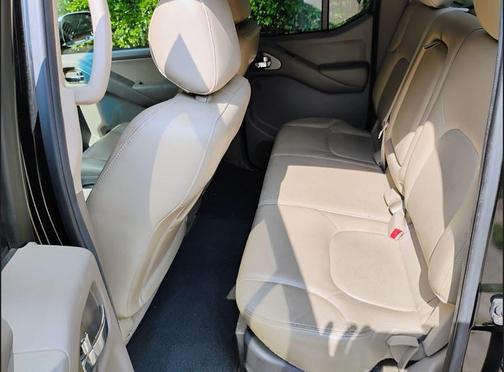 Black 2009 Nissan Frontier LE Crew Cab
