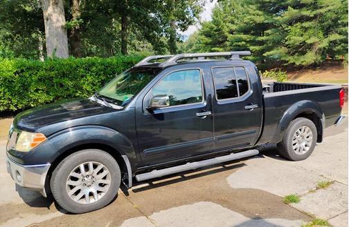 Black 2009 Nissan Frontier LE Crew Cab