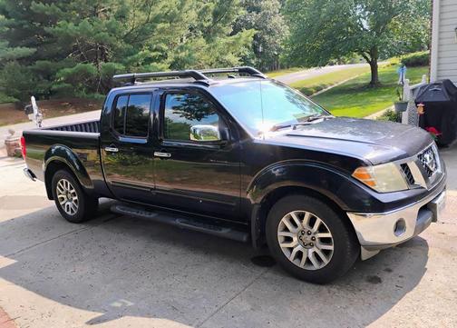 Black 2009 Nissan Frontier LE Crew Cab