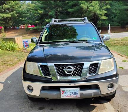 Black 2009 Nissan Frontier LE Crew Cab