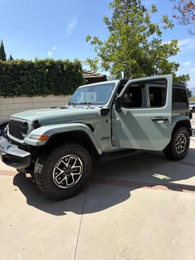 Blue 2024 Jeep Wrangler 4xe Sport S