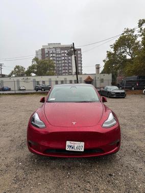 Red 2024 Tesla Model Y Long Range