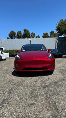 Red 2024 Tesla Model Y Long Range
