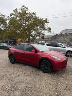 Red 2024 Tesla Model Y Long Range