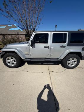 Silver 2010 Jeep Wrangler Unlimited Sahara