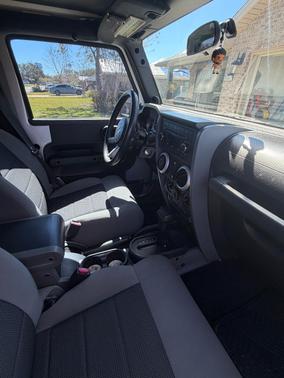 Silver 2010 Jeep Wrangler Unlimited Sahara