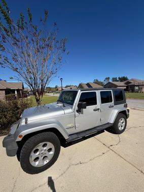 Silver 2010 Jeep Wrangler Unlimited Sahara