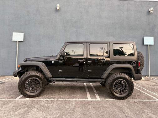 Black 2017 Jeep Wrangler Unlimited Sport