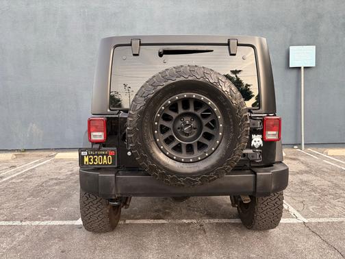 Black 2017 Jeep Wrangler Unlimited Sport