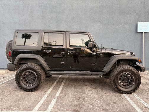 Black 2017 Jeep Wrangler Unlimited Sport