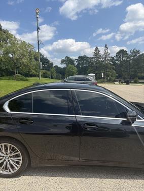 Black 2024 BMW 330 i xDrive