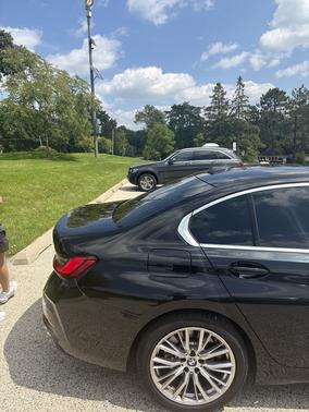 Black 2024 BMW 330 i xDrive