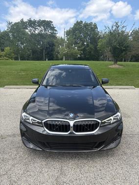 Black 2024 BMW 330 i xDrive