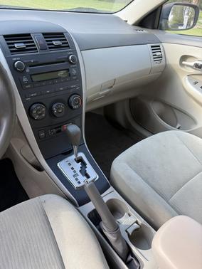 Red 2010 Toyota Corolla Base