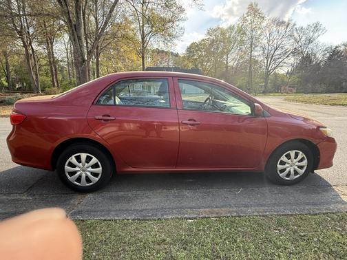 Red 2010 Toyota Corolla Base
