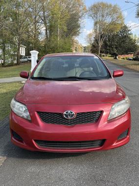 Red 2010 Toyota Corolla Base