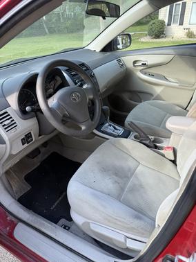 Red 2010 Toyota Corolla Base