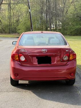 Red 2010 Toyota Corolla Base