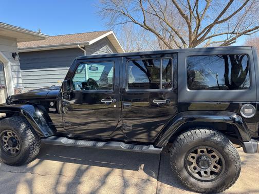 Black 2016 Jeep Wrangler Unlimited Sahara