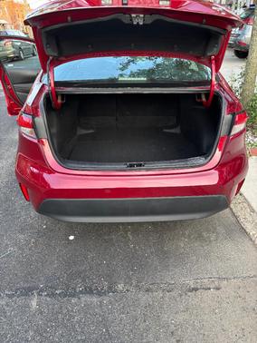 Red 2024 Toyota Corolla LE
