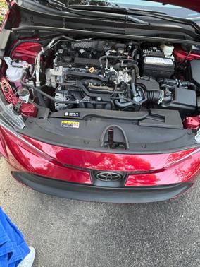 Red 2024 Toyota Corolla LE