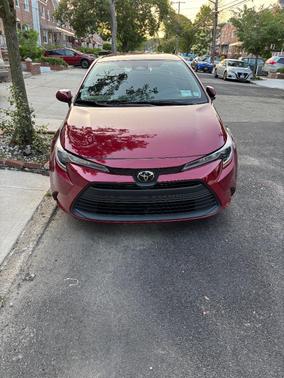 Red 2024 Toyota Corolla LE