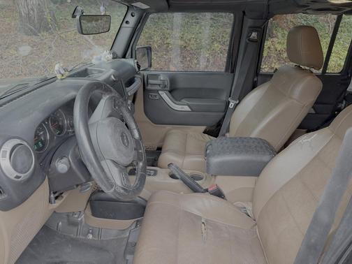 Black 2012 Jeep Wrangler Unlimited Sahara
