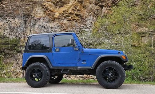 Blue 1999 Jeep Wrangler SE