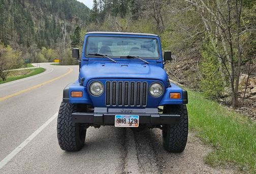 Blue 1999 Jeep Wrangler SE