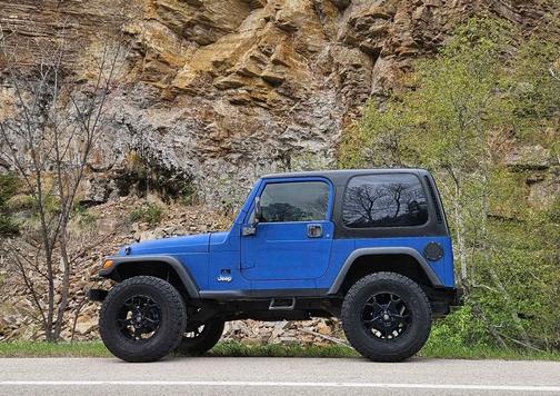 Blue 1999 Jeep Wrangler SE