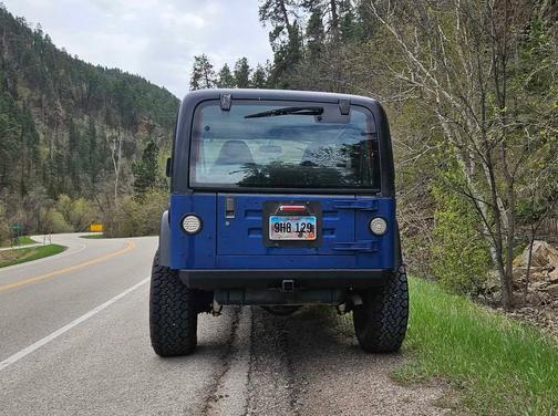 Blue 1999 Jeep Wrangler SE